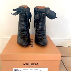 Black booties with a bow on top